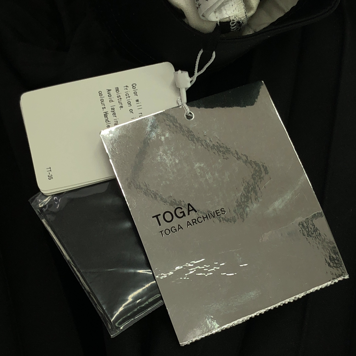 TOGA / トーガ Bonding Pleats Skirt 穴開きデザイン ボンディング プリーツスカート