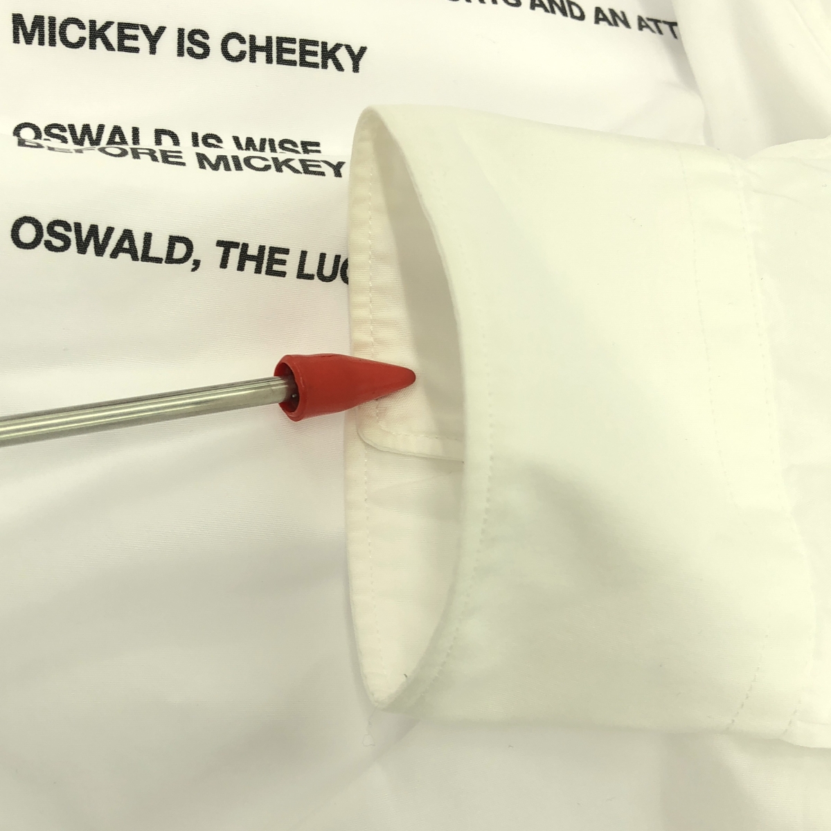 COMME des GARCONS SHIRT / コムデギャルソンシャツ OSWALD / オズワルド・ザ・ラッキー・ラビット ロゴ プリント シャツ