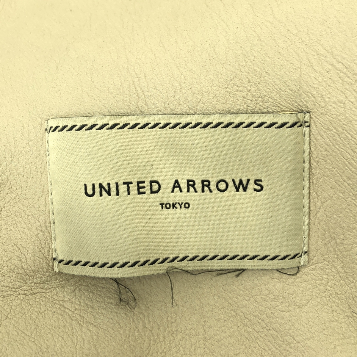 UNITED ARROWS / ユナイテッドアローズ リアルムートンレザー ボア ノーカラー コート