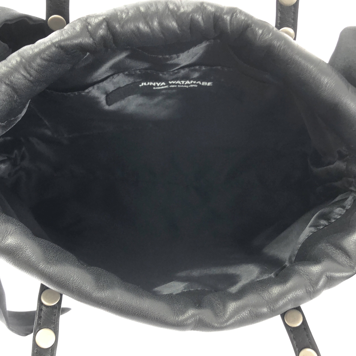JUNYA WATANABE COMME des GARCONS / ジュンヤワタナベ レザー スタッズ装飾 リボン ドローストリング 巾着 ハンド トートバッグ