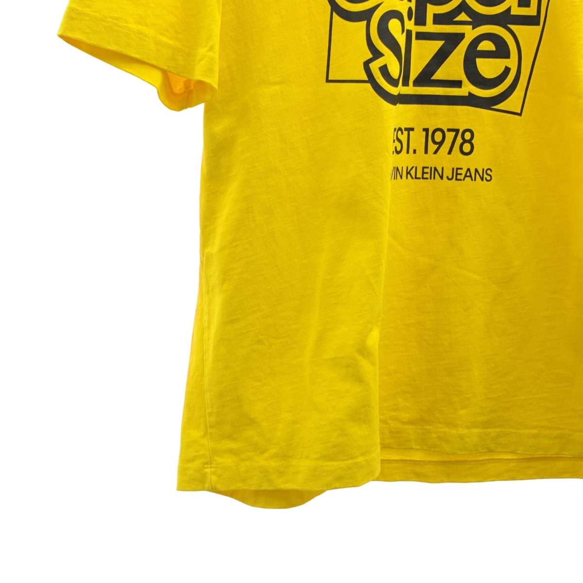 Calvin Klein Jeans / カルバンクラインジーンズ Super Size ロゴプリントTシャツ