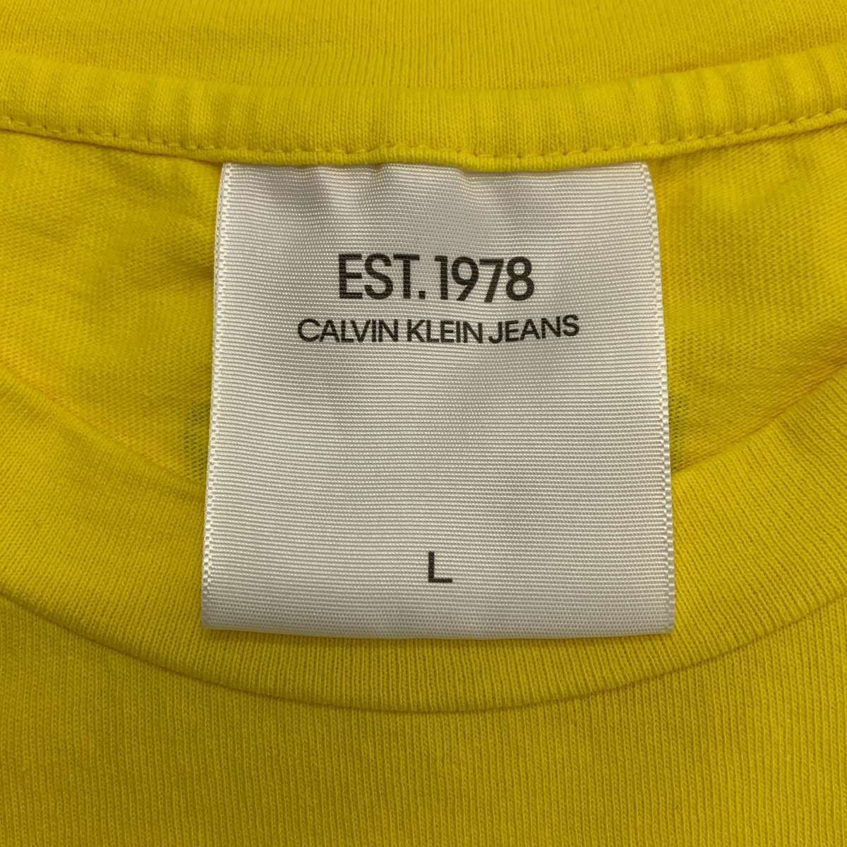 Calvin Klein Jeans / カルバンクラインジーンズ Super Size ロゴプリントTシャツ