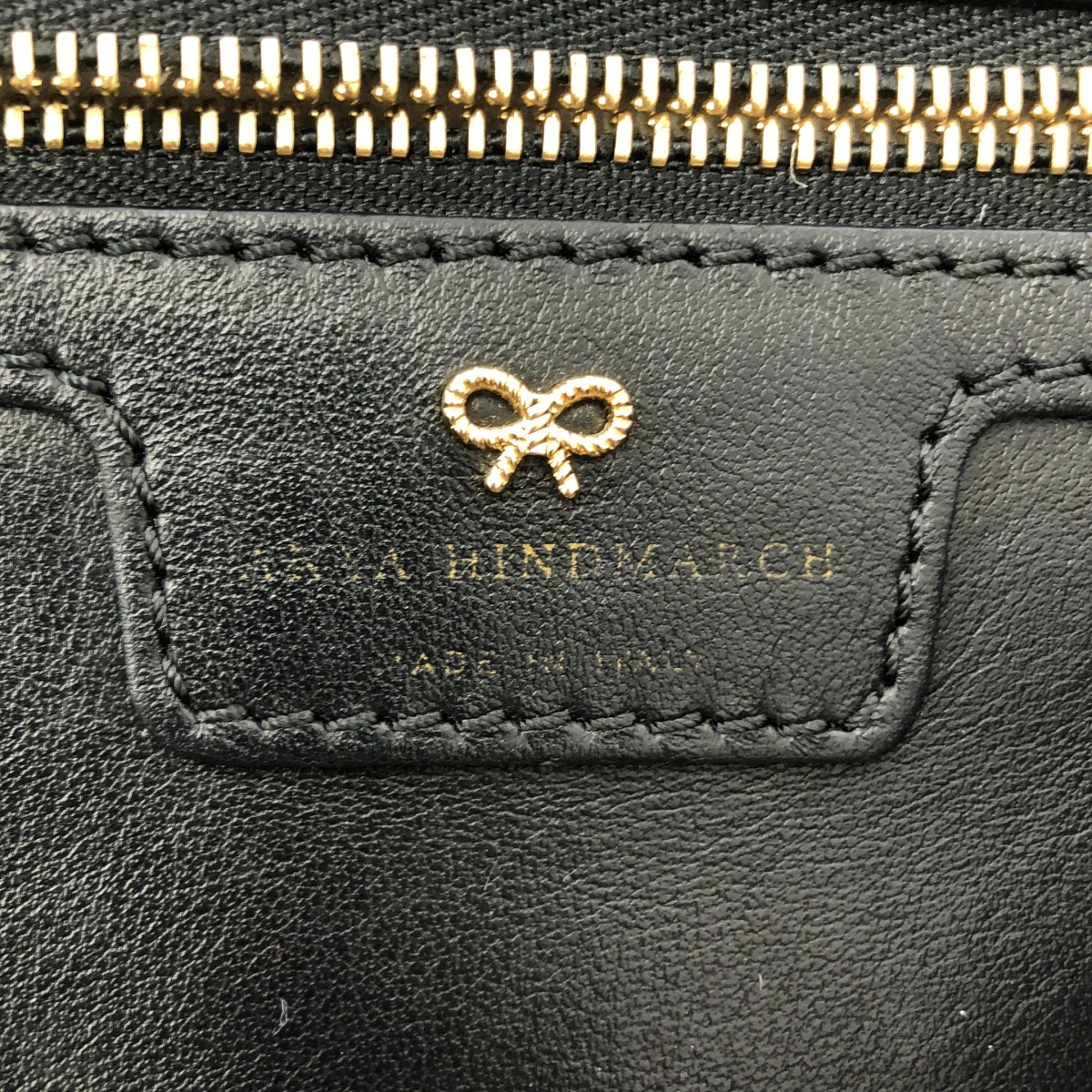 ANYA HINDMARCH / アニヤハインドマーチ レザー パンチング スマイル ハンド トートバッグ