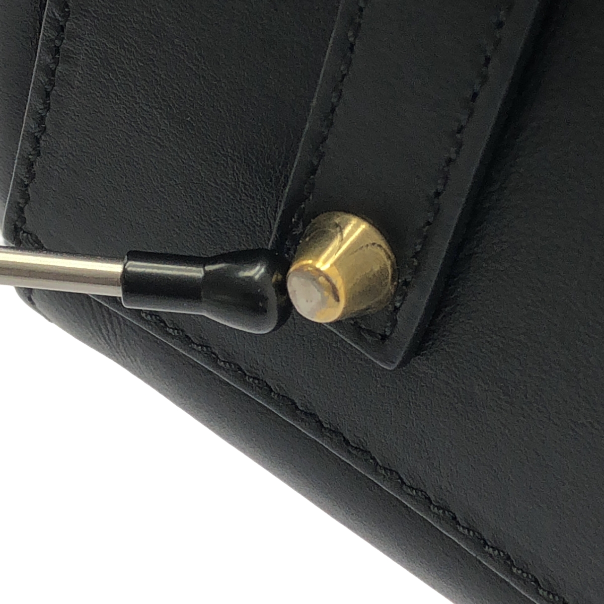 ANYA HINDMARCH / アニヤハインドマーチ レザー パンチング スマイル ハンド トートバッグ