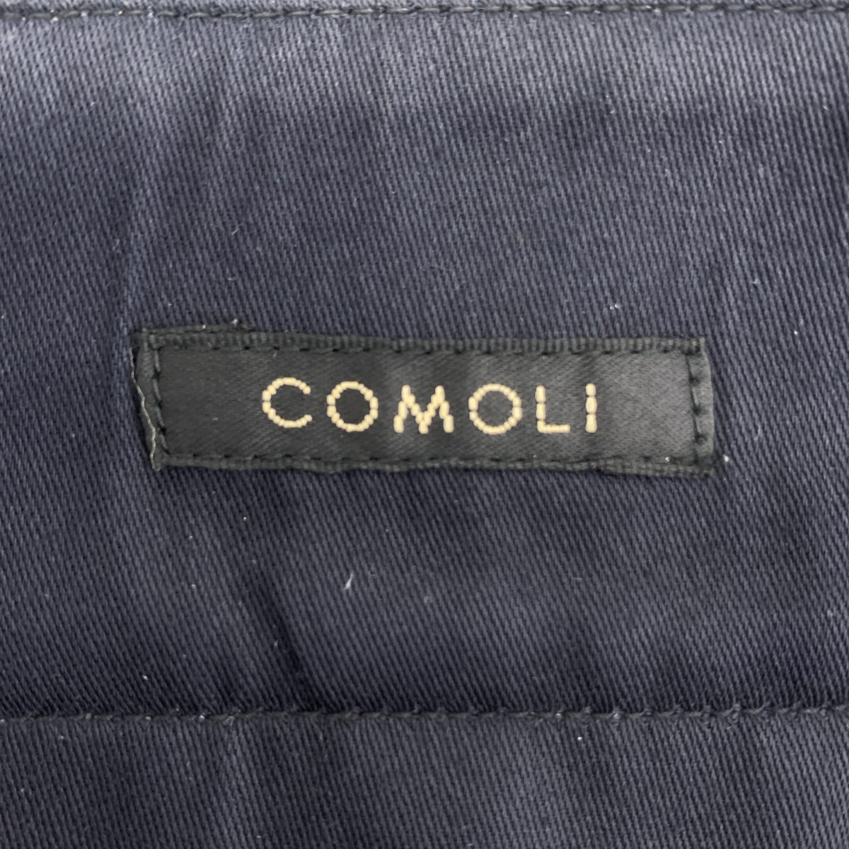 COMOLI / コモリ ポストワークツイルパンツ