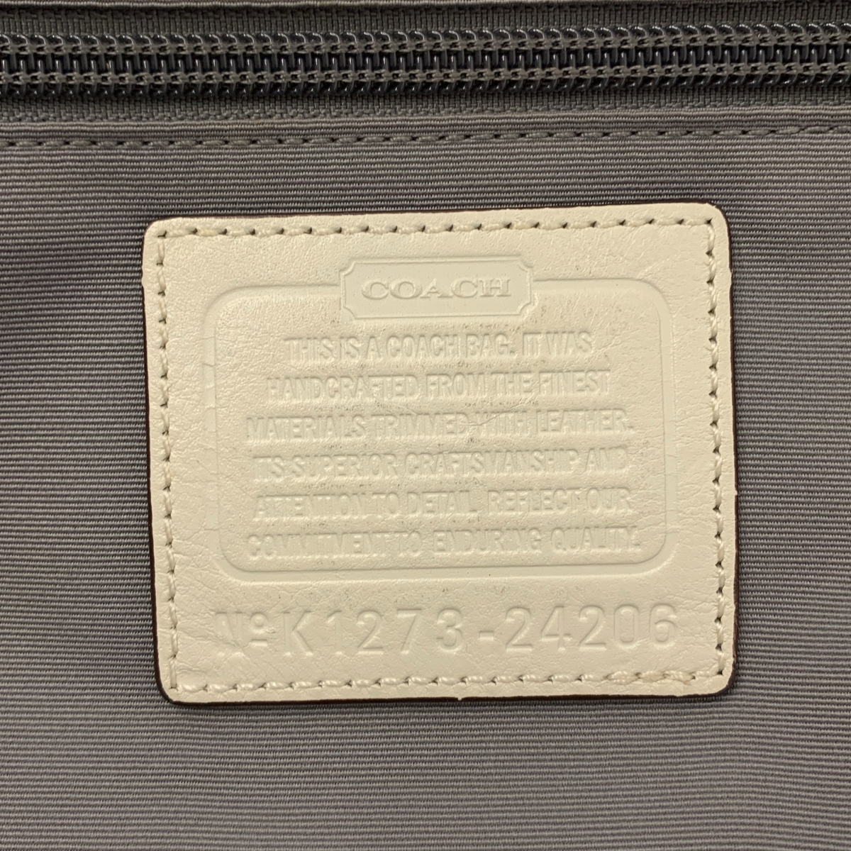 COACH / コーチ レザーハンドル シグネチャー タッセル トートバッグ