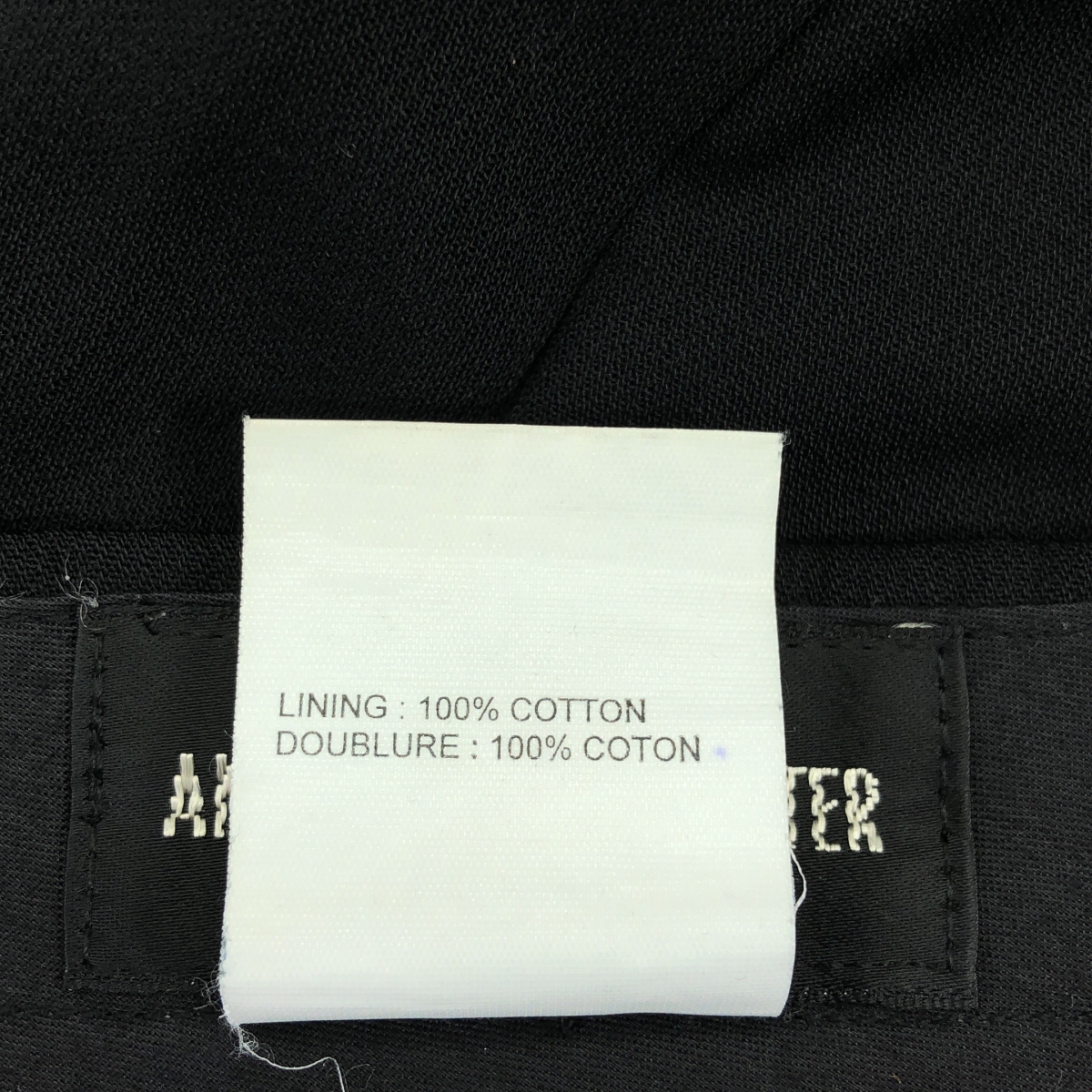 ANN DEMEULEMEESTER / アンドゥムルメステール オリゾンティタグ ウール ナイロン ストレート スラックス