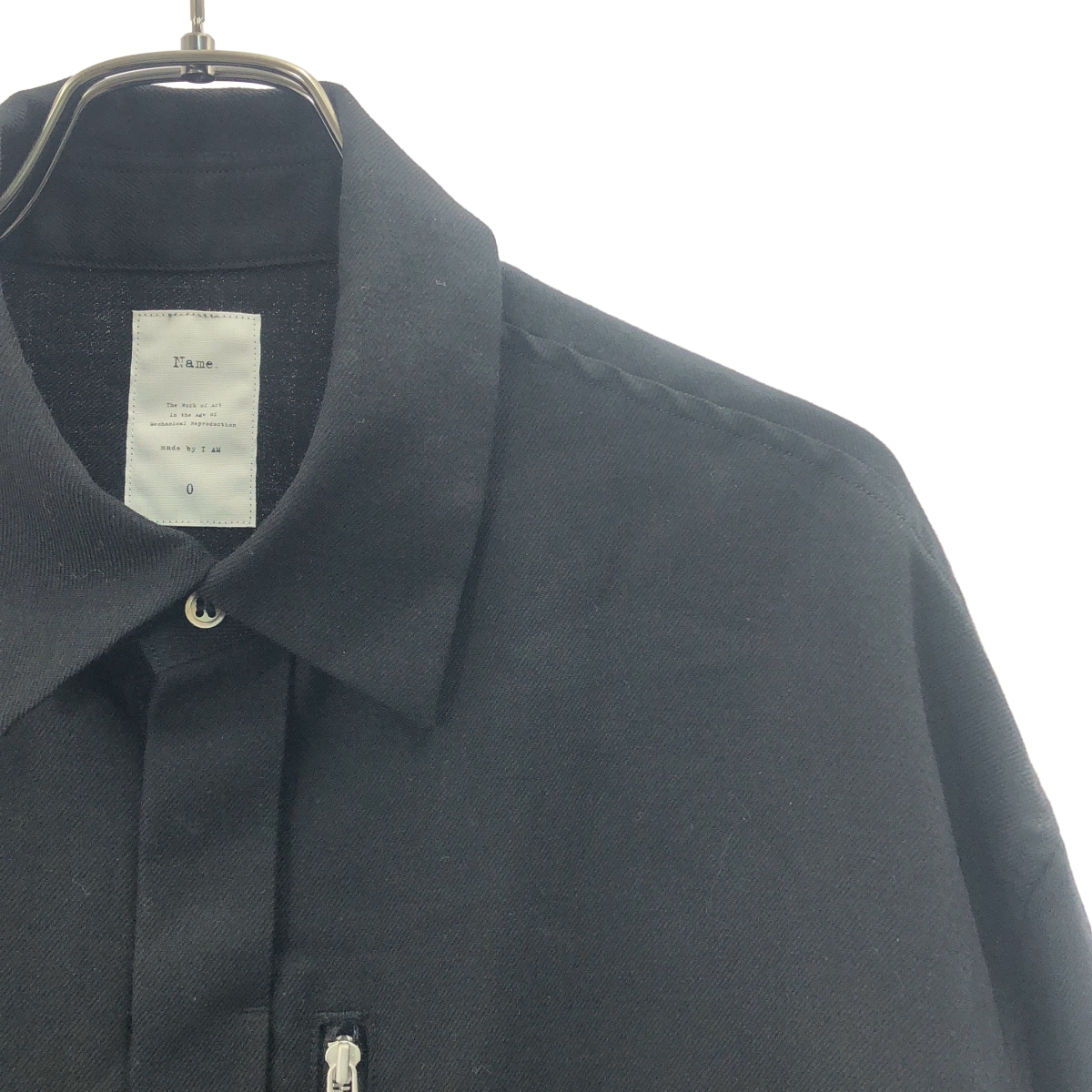 Name. / ネーム オフスケールウール フライフロントシャツ