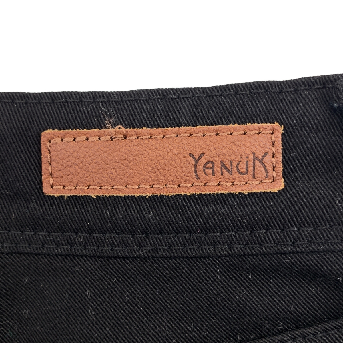 YANUK / ヤヌーク ロゴレザーパッチ ストレッチ スキニー パンツ