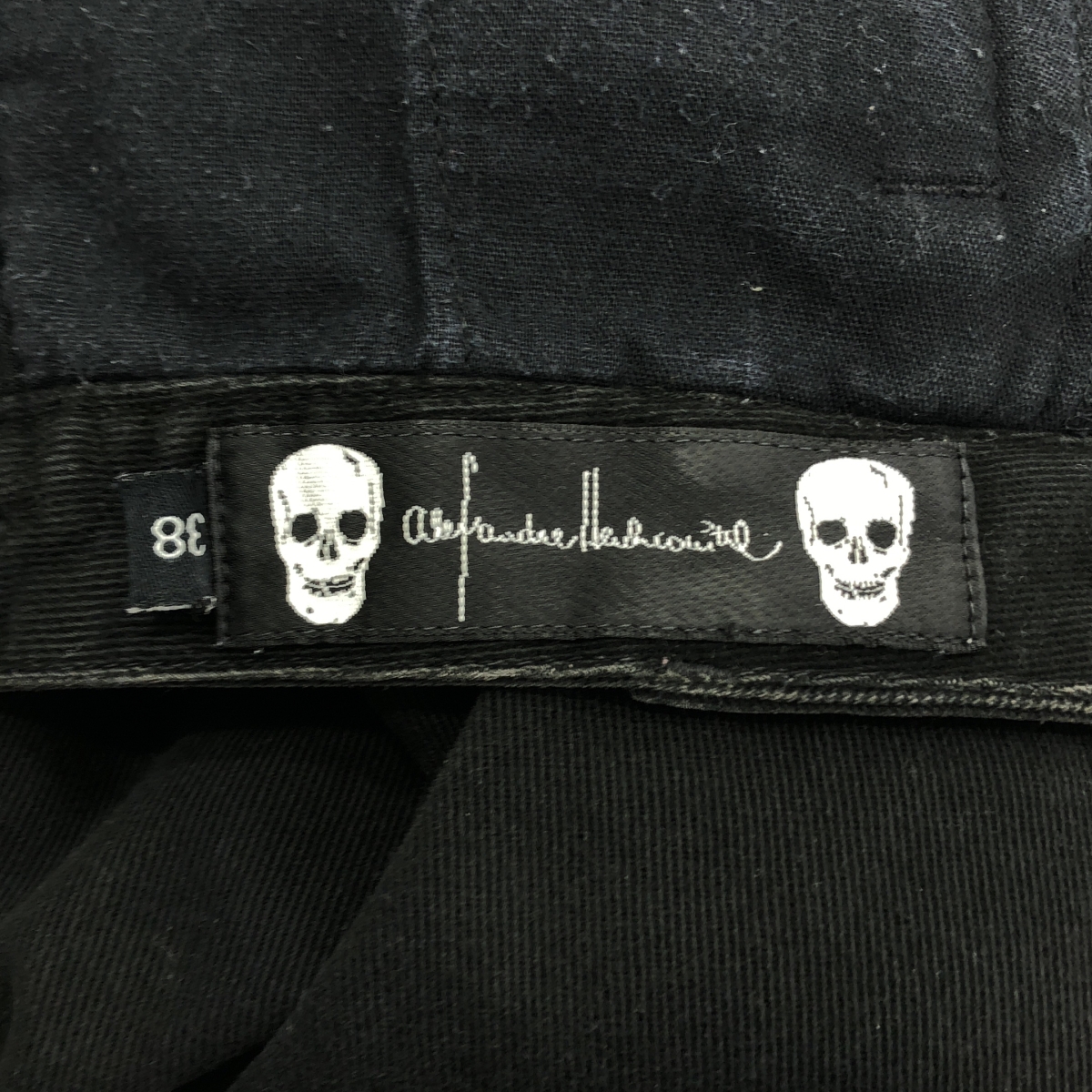 その他 裾ジップスリット スカルボタン スキニーパンツ