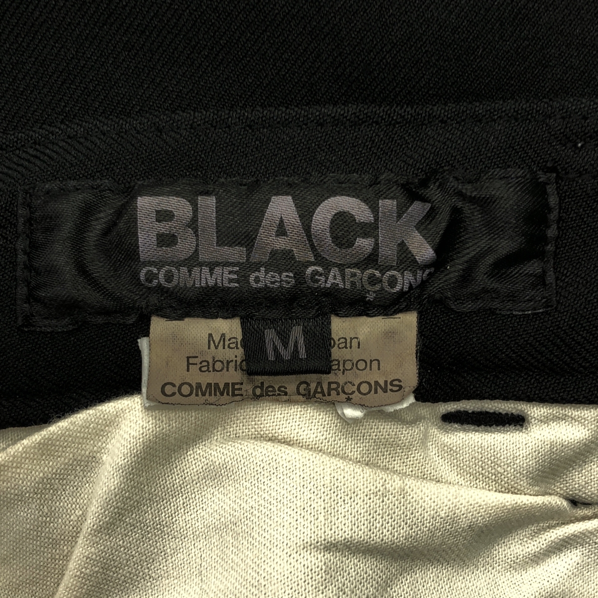 BLACK COMME des GARCONS / ブラックコムデギャルソン ポリエステル縮絨 テーパードパンツ