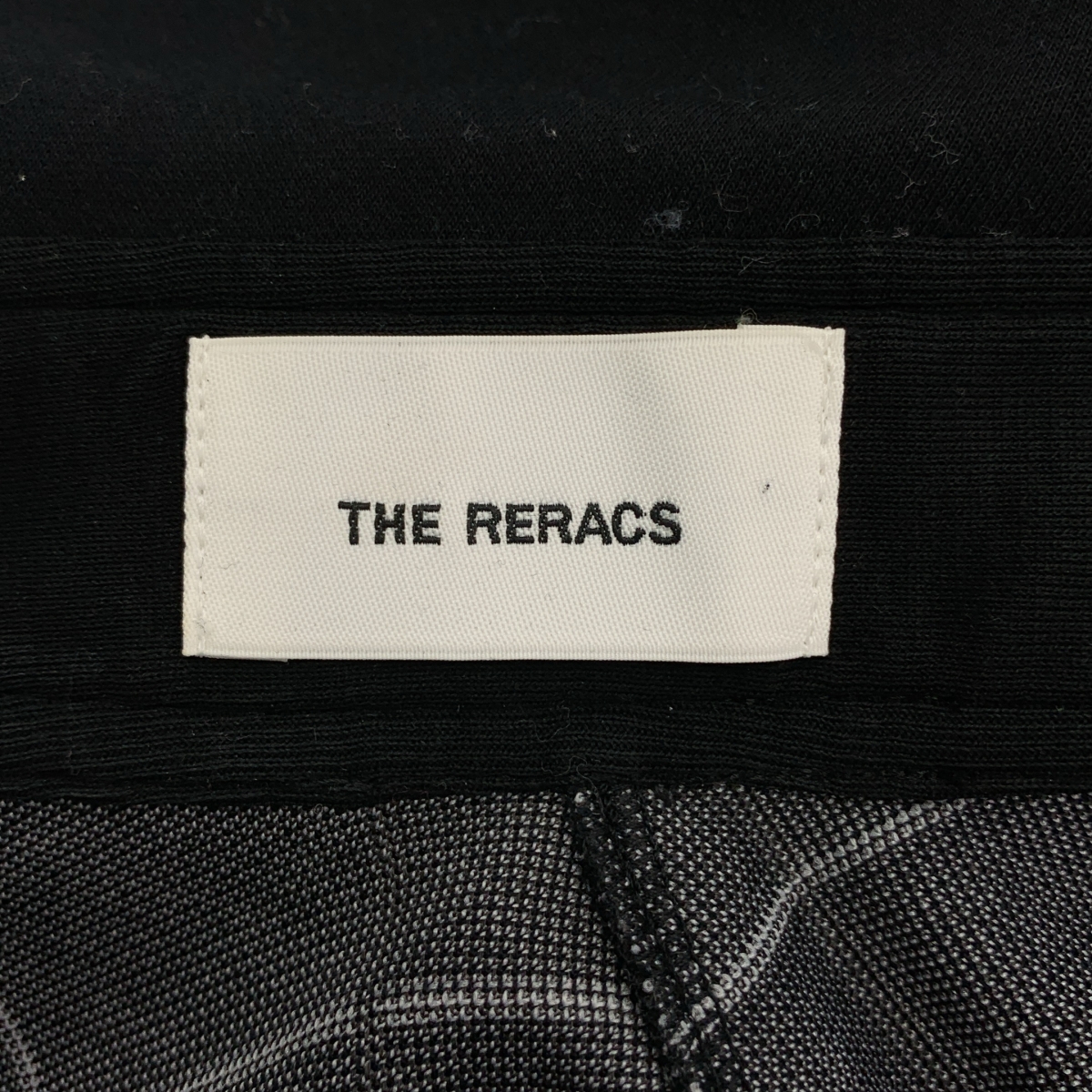 THE RERACS / ザリラクス バックボタン ロゴドローストリング プルオーバー トップス