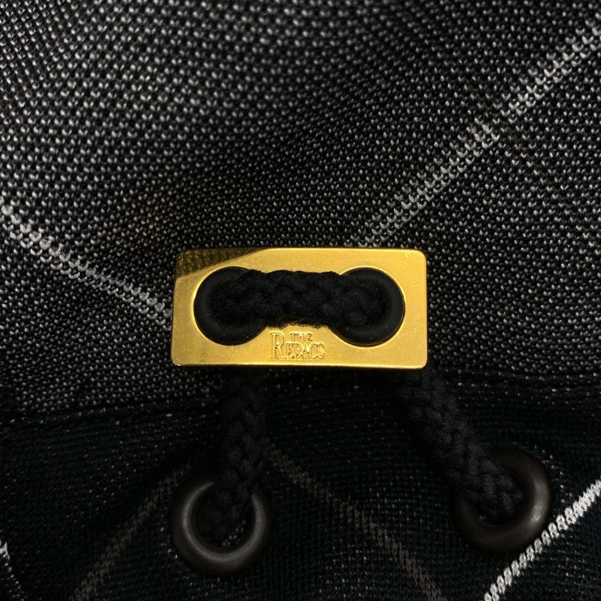 THE RERACS / ザリラクス バックボタン ロゴドローストリング プルオーバー トップス