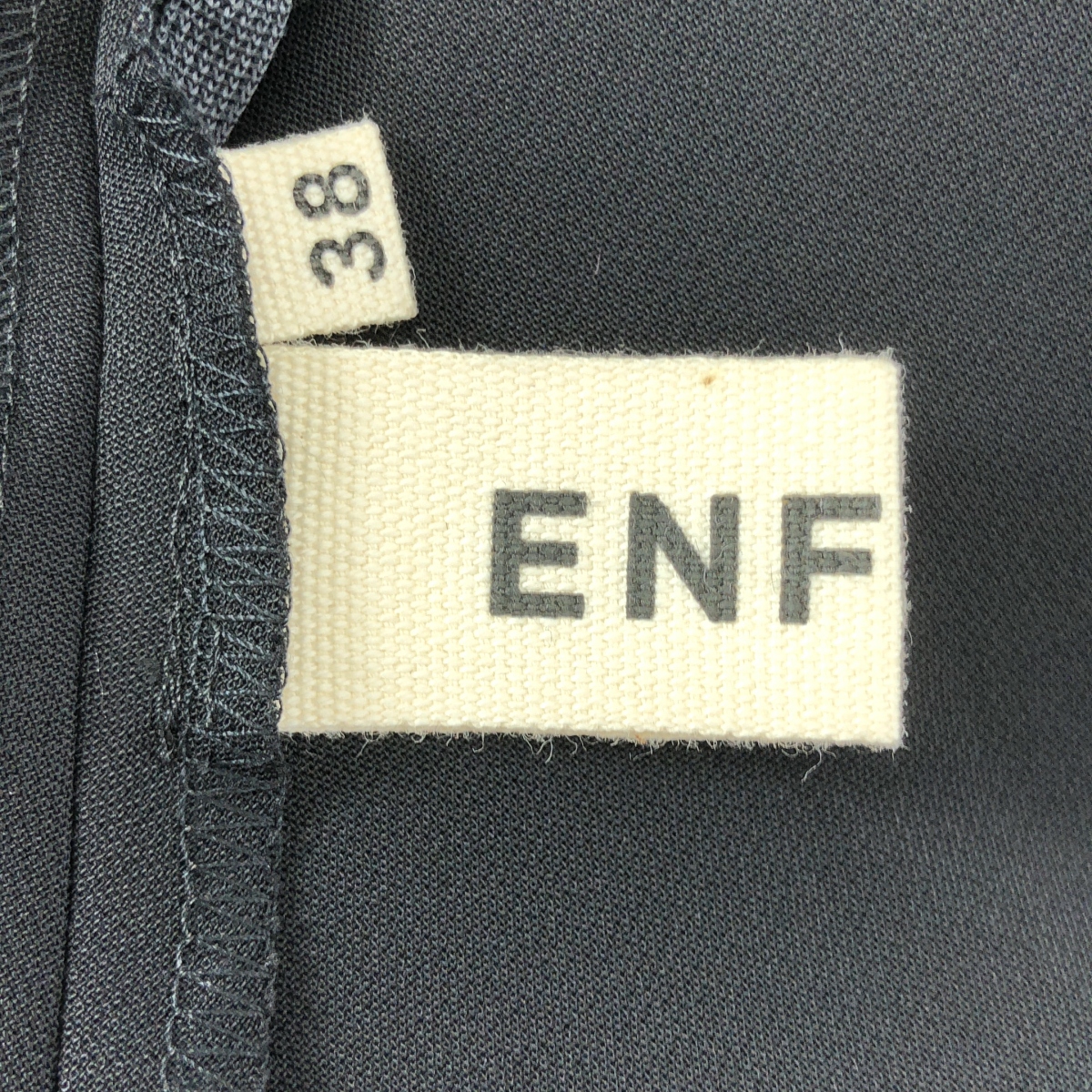 ENFOLD / エンフォルド ドライ ダブルクロス アシンメトリー フレア PO シャツ